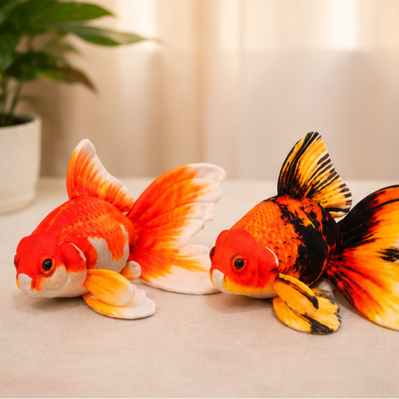 Large Goldfish Kicker Plush for Cats on a light surface with a blurred background